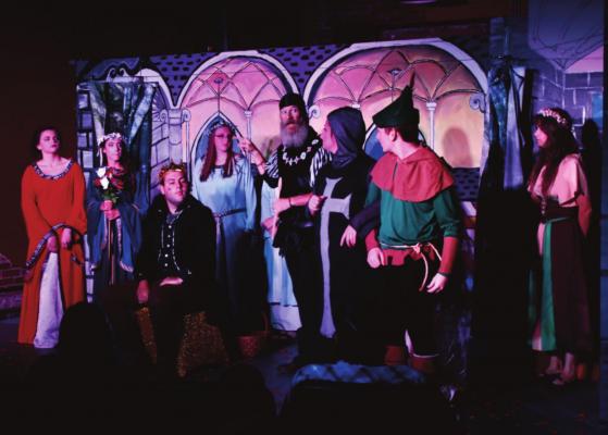 MaKenzie Havard, Kapri Hoffman, Logan Vickers, Kailee Lemoine, Lauren Schlebach, Autumn Miller, Miles Harden, Jayne Fuller, Lawson Vickers, and Rachael Sanders doing Robin Hood in a way you have never seen. Reporter photo by Bill Dodson