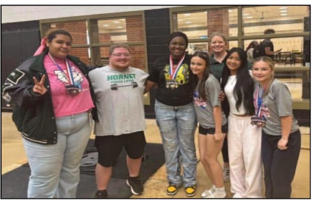 Lady Hornets Shine at Powerlifting Meet, Oliphant Advances to State