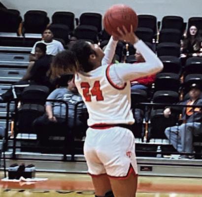 Up for two… West Sabine Lady Tiger Isis Diaz goes up for two of her game high 17 points in their 52-29 victory over Kirbyville November 14. Reporter photo by Cecil Tatom