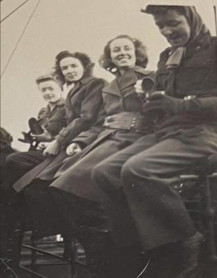 On the ship... Lucille, pictured center-right, on the U.S.S. Argentina enroute to Scotland.