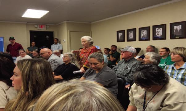 Forrmer School Board Member Janis Speights addressed the Board and a large crowd