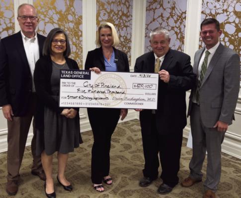 Pineland Mayor Pro-Tem Tracy Lane joined the Texas General Land Office (GLO) and Commissioner Dawn Buckingham as she presented the city with a check for $500,000 for street and drainage improvements. This funding was awarded to the city through the GLO’s Regional Mitigation Program. Thank you to the GLO and Commissioner Buckingham for this award that will allow our city to be more resilient against future storms and disasters!' photo submitted