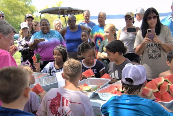 The watermelon-eating contest brought smiles and laughs to the large crowd at Jackson Hill