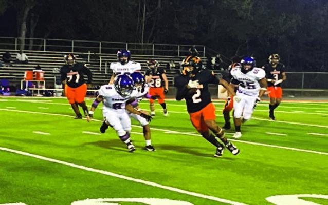 Paydirt… Tiger RB Brennan Richardson dashes 34 yards for a score against Sabine Pass Nov. 7 in Pineland. Reporter photo by Cecil Tatom