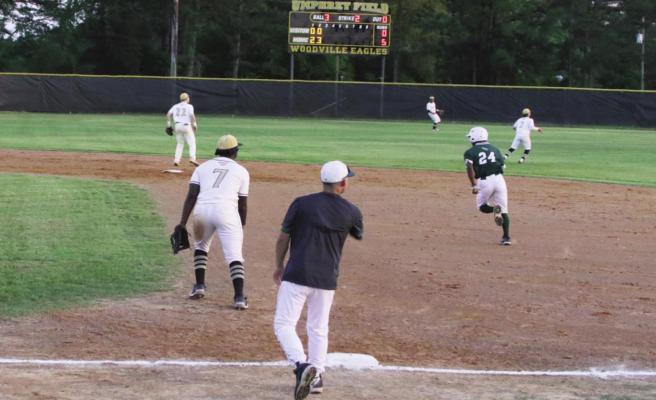Eagles best Hornets in playoffs... DeKevin Smith, (24) cruising into 2nd with a Game 1, 3rd inning double Reporter photo by Bill Dodson