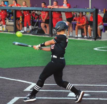Solid Contact... Lady Tiger Cora Supulvado makes solid contact against Groveton on May 13 in Lufkin. Reporter photo by Cecil Tatom act...