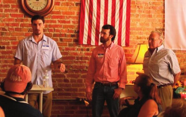 Big changes underway! Chase Collins (left) of Lost Frontier RV Park introduces new owners Stephen Brewer (center) and Steve Brewer (right) Reporter photo by Kenny Wick