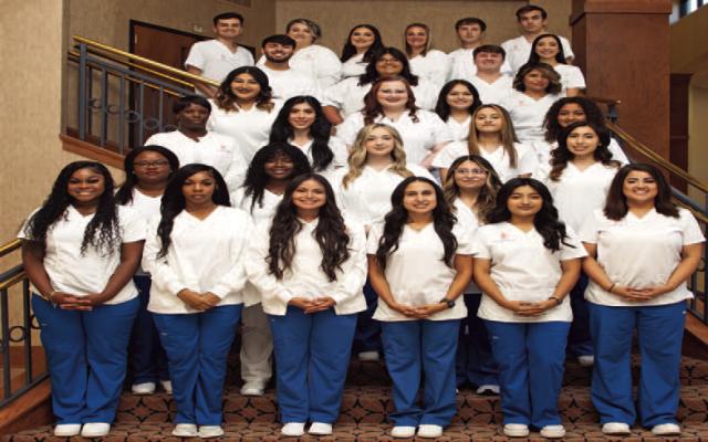 Angelina College MEEP (Multiple Entry-Exit Program) graduates pose inside Temple Theater before Thursday’s Nursing Program pinning ceremony on the AC campus. Photo submitted