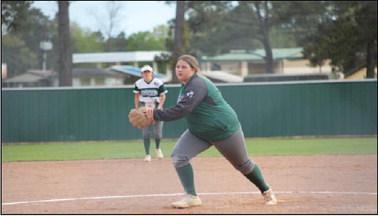 Hemphill Hornet freshman pitcher Raelee Conn got her first district win in the circle while big brother Bo had his last first district win right up the hill. The Lady Hornets won 10-0. Reporter photo by Johanna Vickers