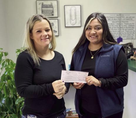 Sabine County Reporter donated $750 to Family Crisis Center of East Texas thanks to the Save the Boobies benefit we held in October. Reporter photo by Johanna Vickers