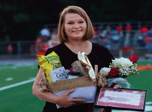 During Friday night’s Homecoming festivities, Regina McBride was recognized for 25 years of service to the West Sabine Tigers with the Life Saver Award! Homecoming Photos taken by Jana Pate of The Wise Image