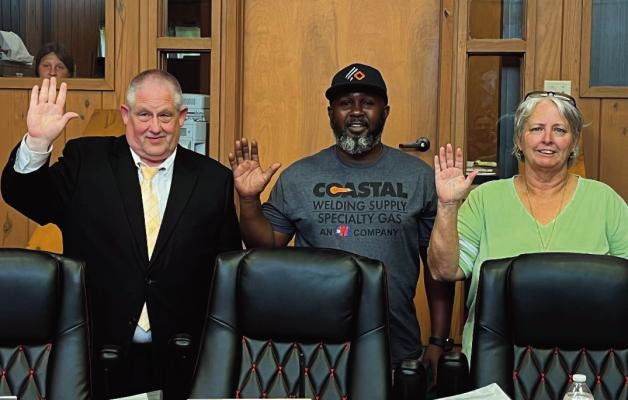 Sworn in… Council members for places 1, 3 and 5 were officially sworn in at the May 21 Pineland City Council meeting. They are(from l to r)Tracy Lane, Demond Williams, and Lisa Welch. Reporter photo by Cecil Tatom