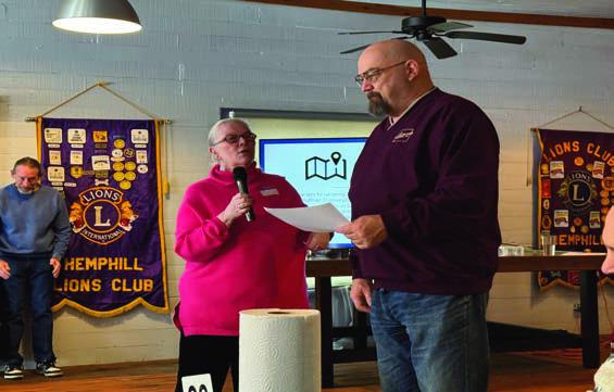 Sherri Jones thanks Frank Torres for help with Bingo fundraiser on Jan. 5th.