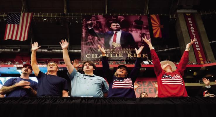 Participants worship during the memorial service honoring Charlie Kirk at State Farm Stadium in Glendale, Arizona, on Sept. 21, 2025. Charlie Kirk, the conservative activist and founder of Turning Point USA was assassinated on Sept. 10, 2025. Rob Schumacher/The Republic