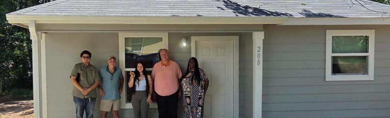 Pineland families receive keys to newly reconstructed homes through HRA program