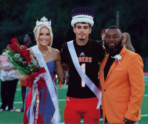 It was a great night to be a Tiger. Gracie Ross was voted Queen and Football sweetheart and Laken Quick took home the crown as well as the Mr. Football Title. For full details and game highlights, check out pages 7 and 8. Pictured above: Ross, Quick and Dr. Gilder Homecoming Photos taken by Jana Pate of The Wise Image
