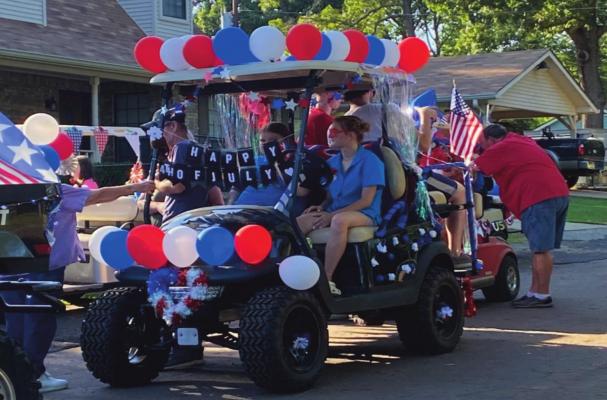 Parade of golf carts and fireworks...