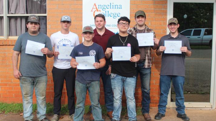 Local students complete the NCCER Heavy Equipment Operator Level 1 on May 11 at the Lincoln School in San Augustine. This is the first time Hemphill ISD has participated in this class according to the professor and they all completed it. Pictured from left to right are Hayden Sepulvado, Mason Wright, Carson Hill, Professor Curtis Griffin, RJ Villigrana, Jacob Hester and Andrew Brimer. Reporter photo by Samantha Hill