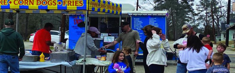 Mardi Gras Festivities Bring Color, Community to Downtown Hemphill