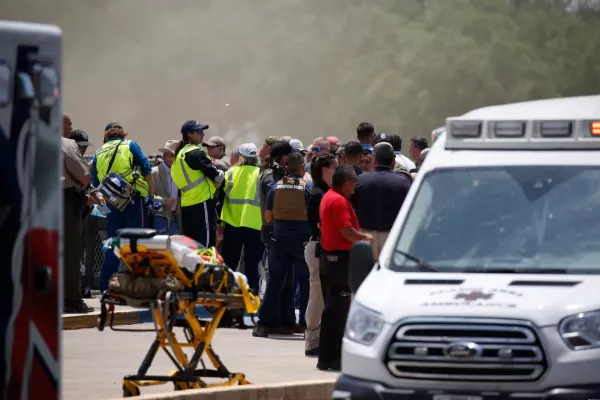 Emergency personnel gather near Robb Elementary School following a shooting, Tuesday, May 24, 2022, in Uvalde, Texas AP Photo/Dario Lopez-Mills