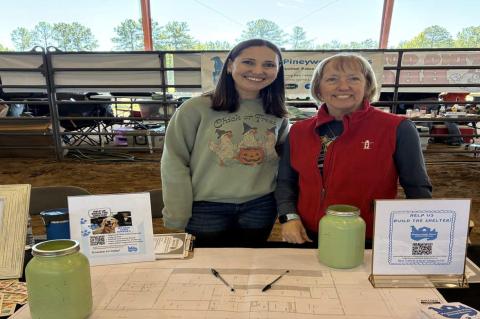Volunteers Whitney Balingit and Debra Leblanc with Pineywoods Paws Animal Rescue were set up at this weekend’s BBQ Cookoff seeking community support to build an animal shelter serving Sabine and San Augustine counties. Donations will help the nonprofit move forward with its completed shelter plans. Complete story to come. Photo by Cynthia Beard